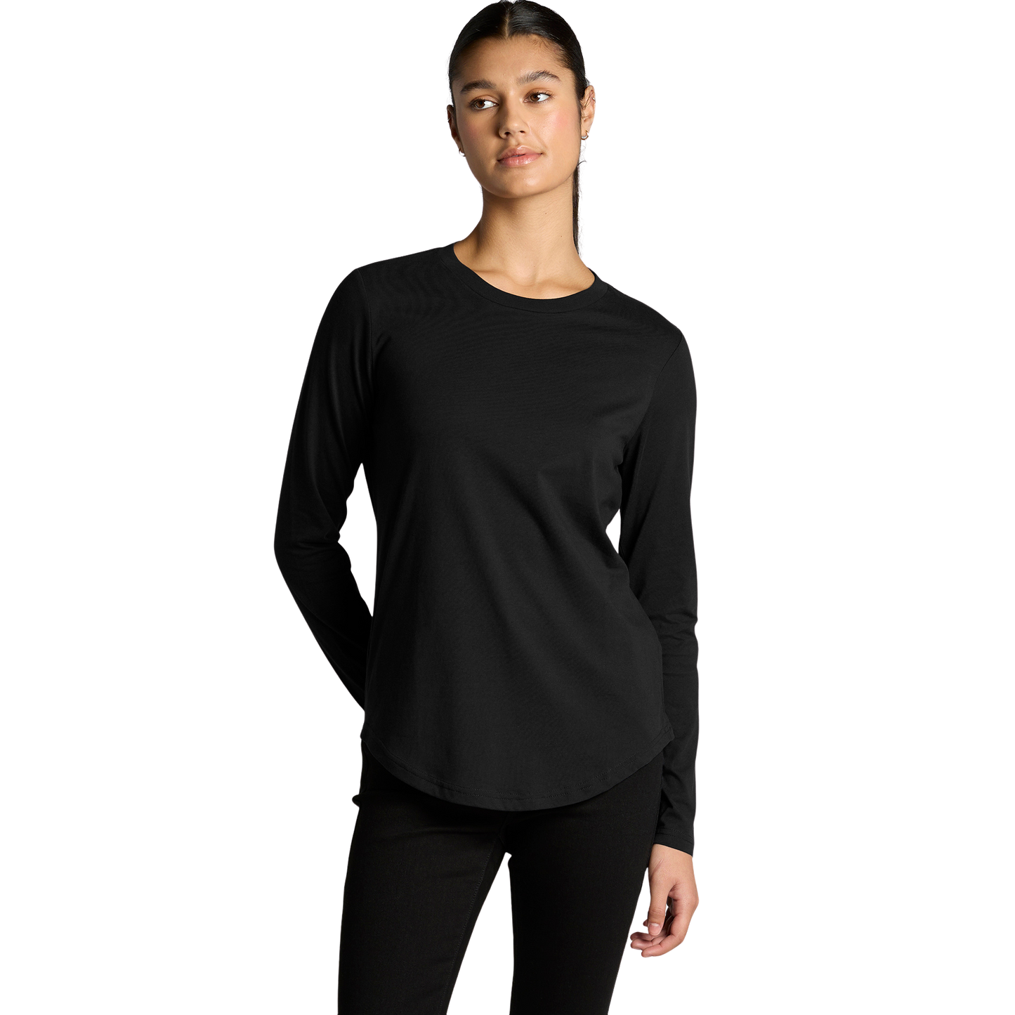 Front view of woman wearing black AS Colour Ladies Maple Curve Long Sleeve T-shirt with right hand behind back looking to the right