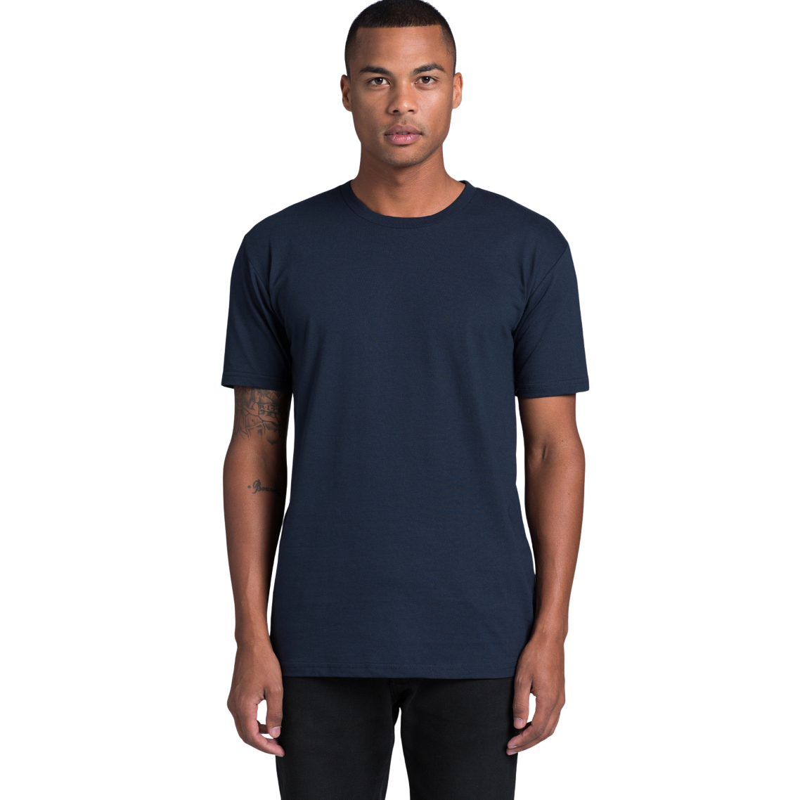 Front view of man wearing navy AS Colour Staple T-shirt looking straight ahead