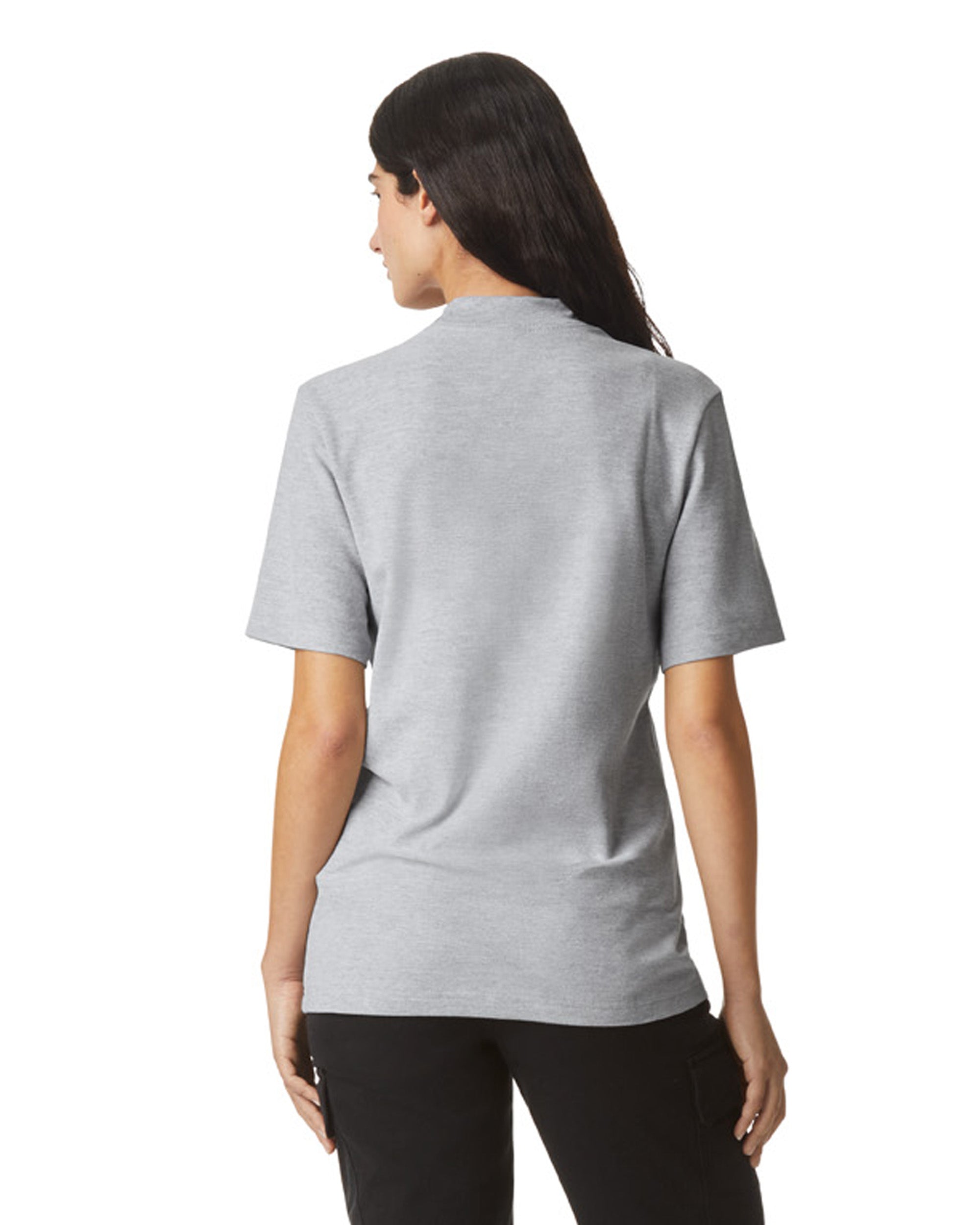 Back view of woman wearing grey American Apparel Unisex Pique Mock Neck T-Shirt with hair over right shoulder looking left