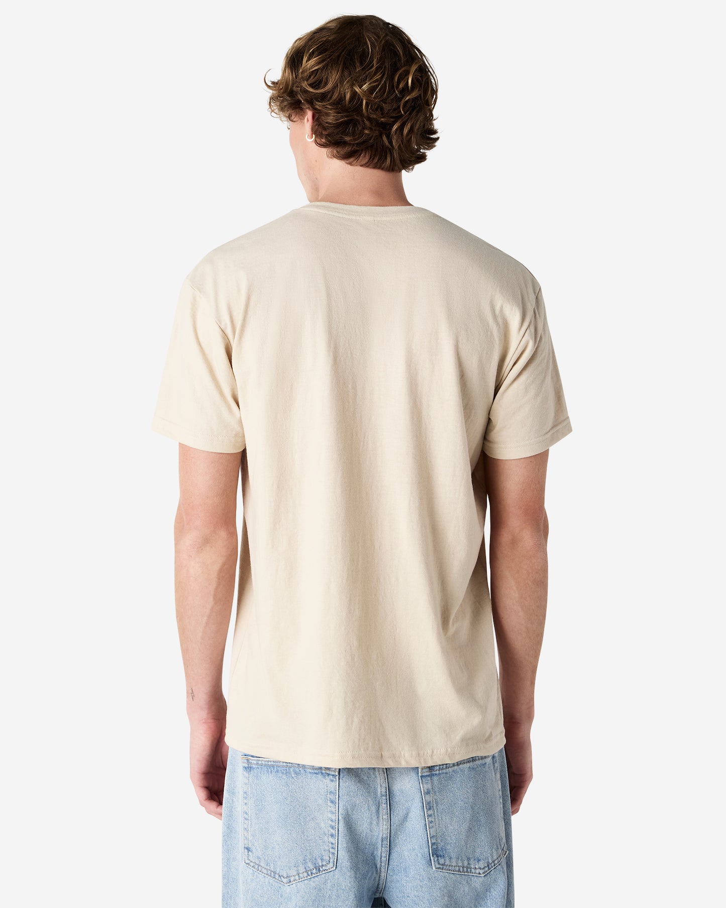 Back view of man wearing unisex bone coloured American Apparel Henley T-shirt with arms by side