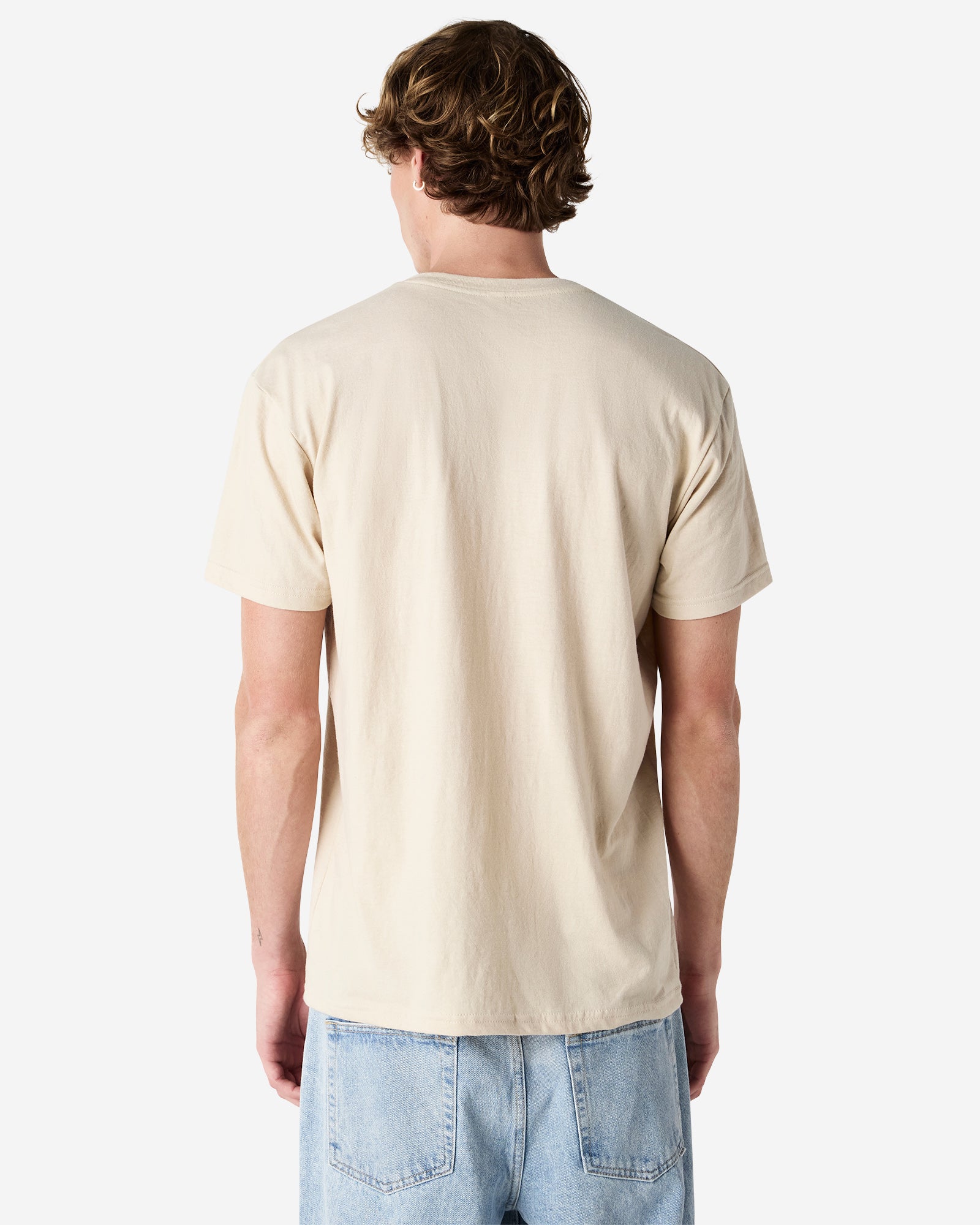 Back view of man wearing unisex bone coloured American Apparel Henley T-shirt with arms by side