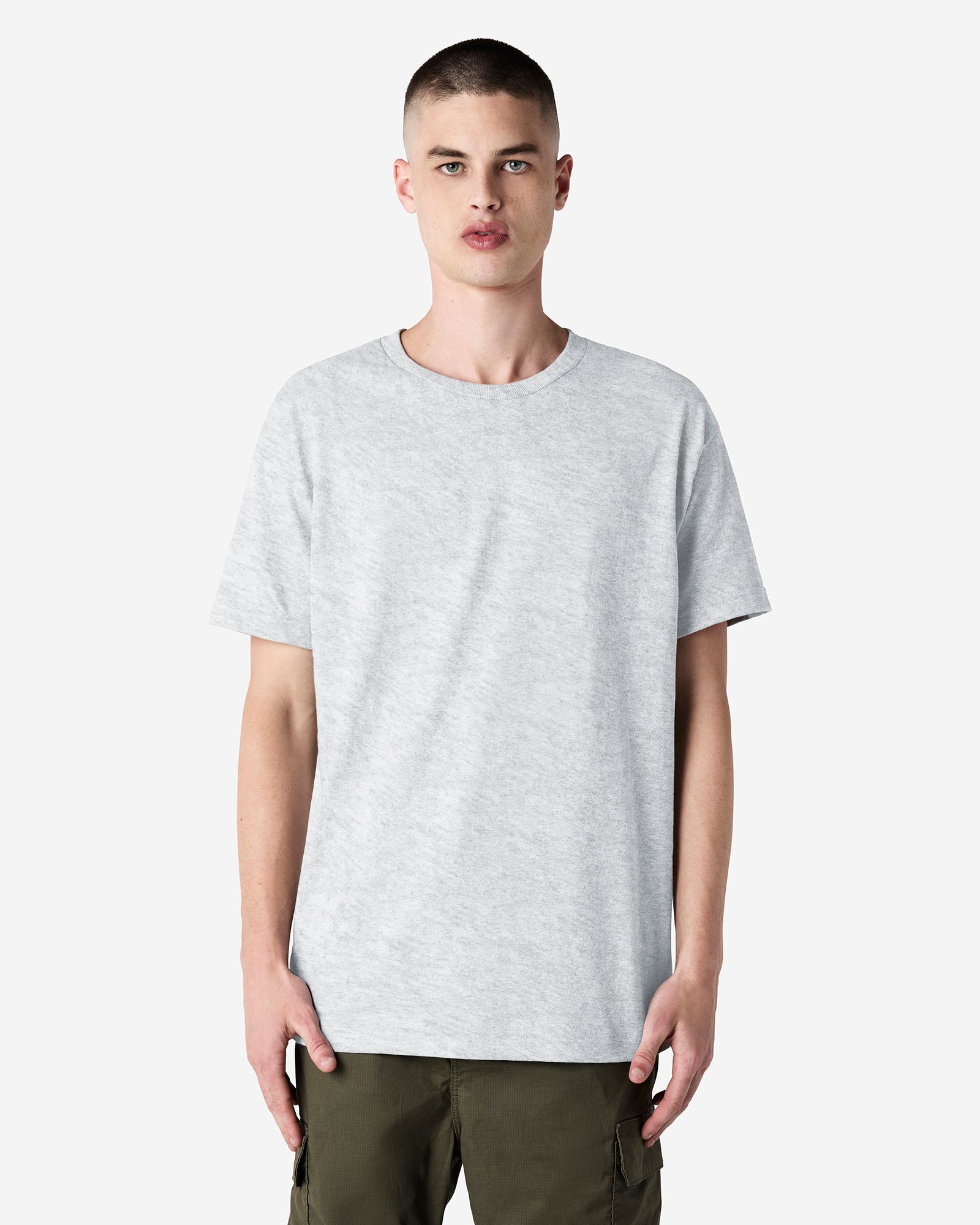 Front view of man wearing grey American Apparel Heavyweight Unisex T-Shirt looking directly towards camera