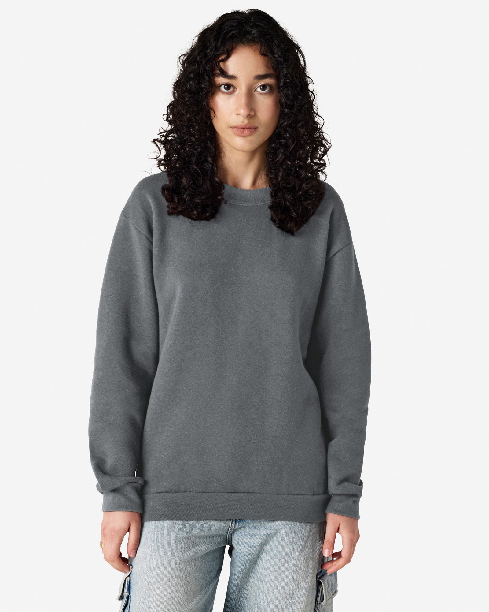Front view of woman with black hair wearing asphalt coloured American Apparel Crewneck Sweatshirt