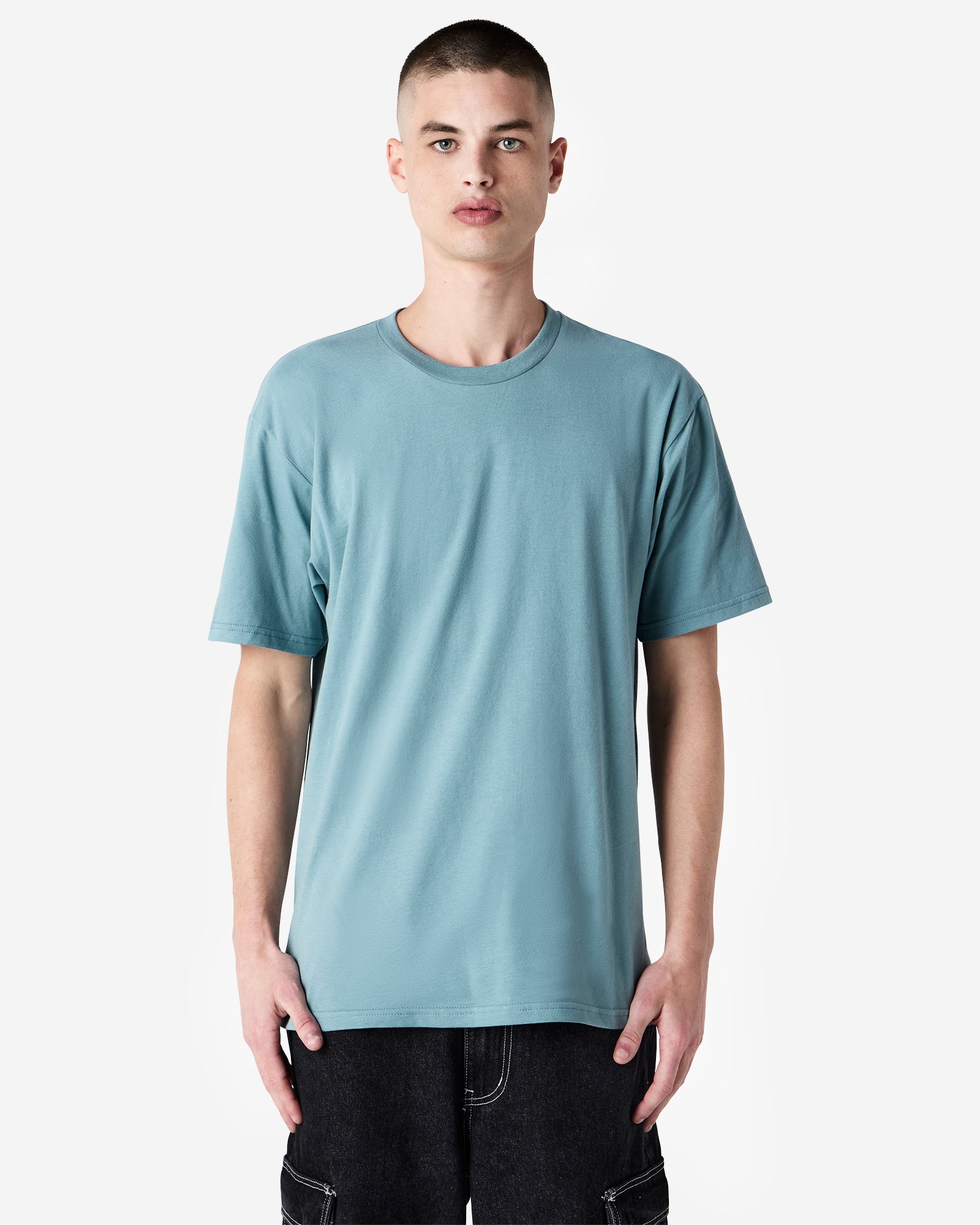 Front view of man wearing sueded arctic coloured American Apparel Unisex Sueded T-Shirt looking directly at camera