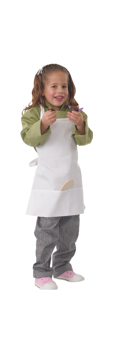 Front view of child wearing white apron holding biscuits
