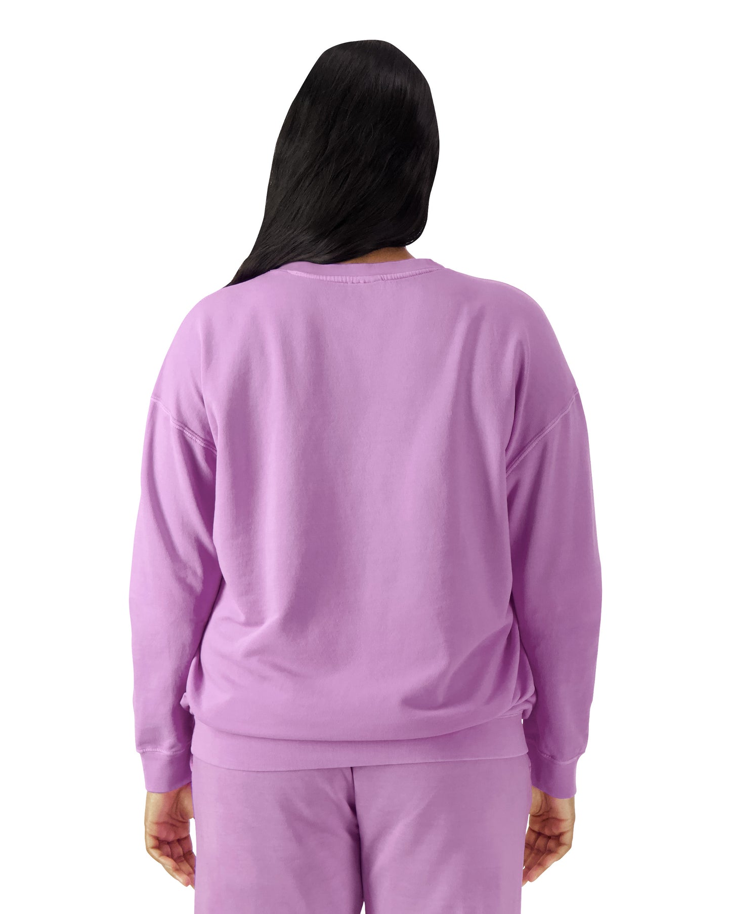 Back view of woman wearing neon violet coloured Comfort Colors Lightweight Sweatshirt with long hair over left shoulder