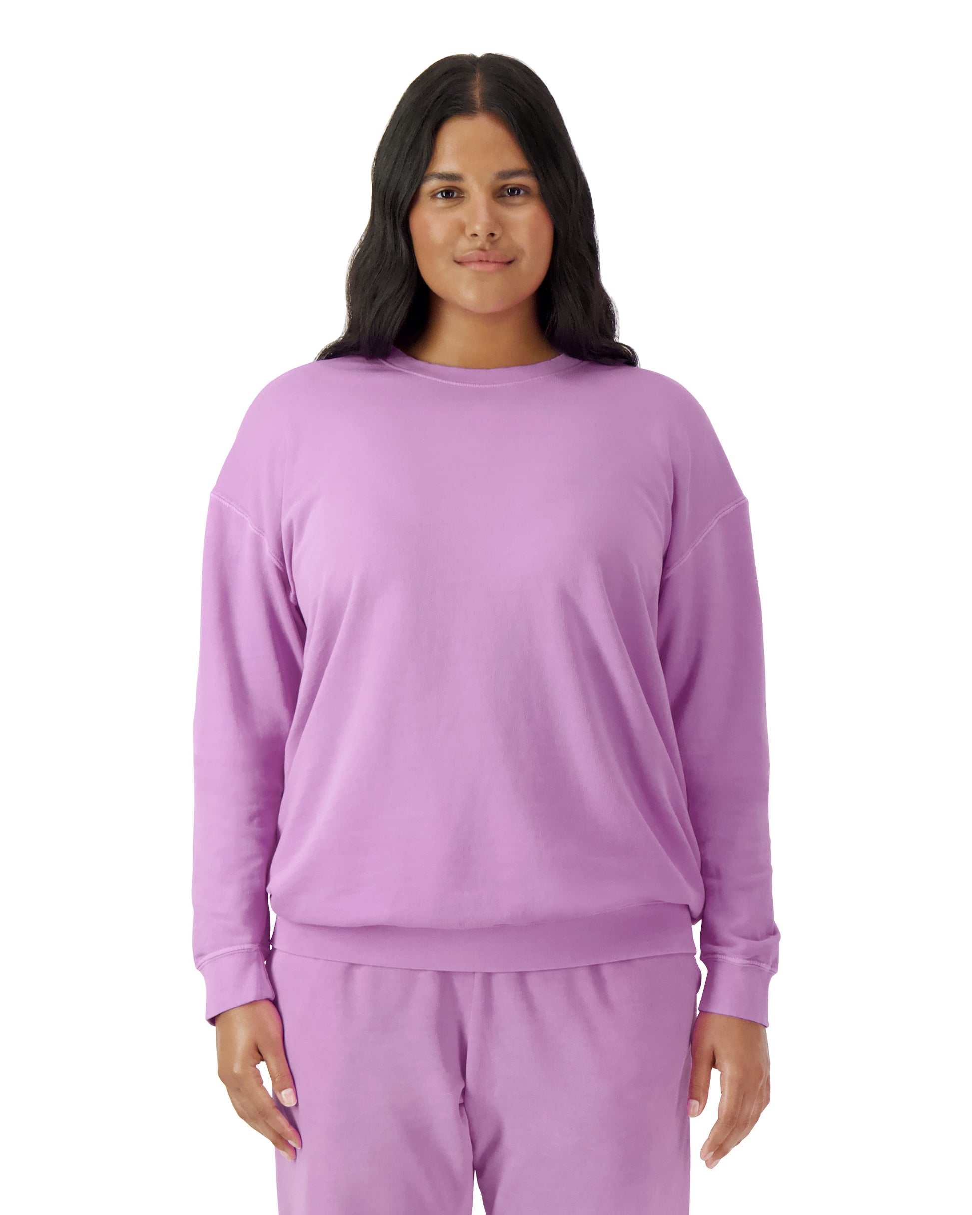 Front view of woman wearing neon violet coloured Comfort Colors Lightweight Sweatshirt looking straight ahead