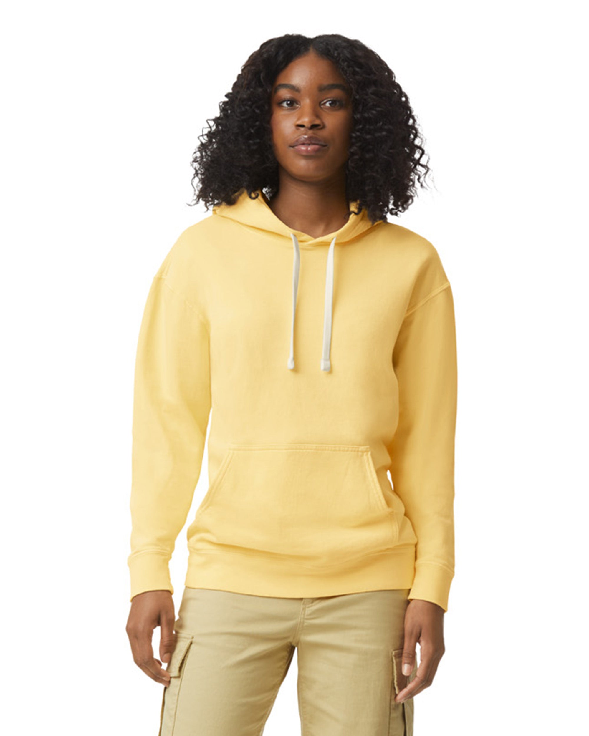Front view of woman wearing butter coloured Unisex Comfort Colors 1467 Lightweight Hooded Sweatshirt looking straight ahead