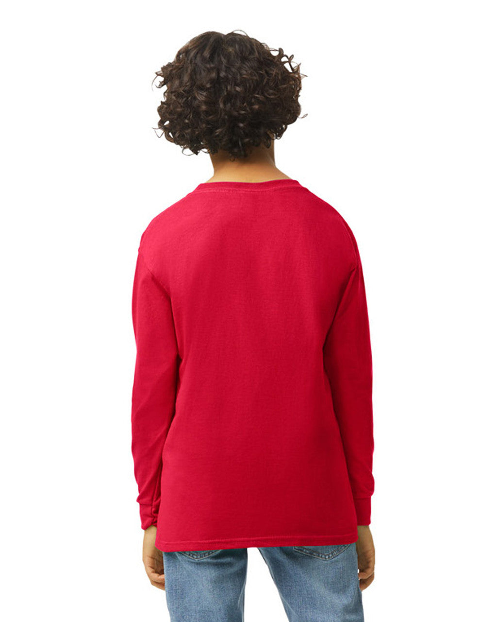 Back view of youth wearing red Gildan 5400B Heavy Cotton Youth Long Sleeve T-Shirt with hands by side