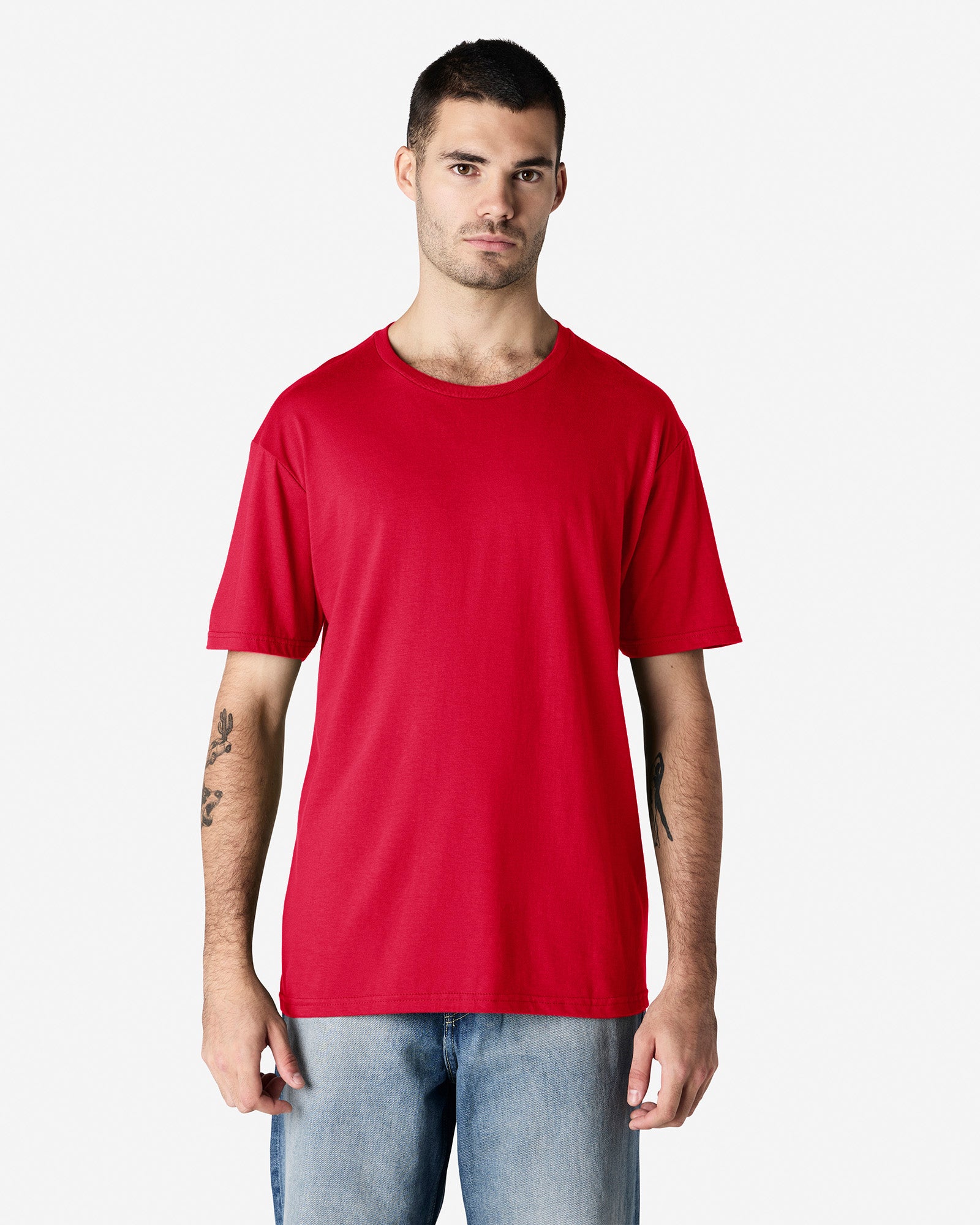 Front view of man wearing cherry red Gildan Adult Softstyle T-Shirt looking straight ahead