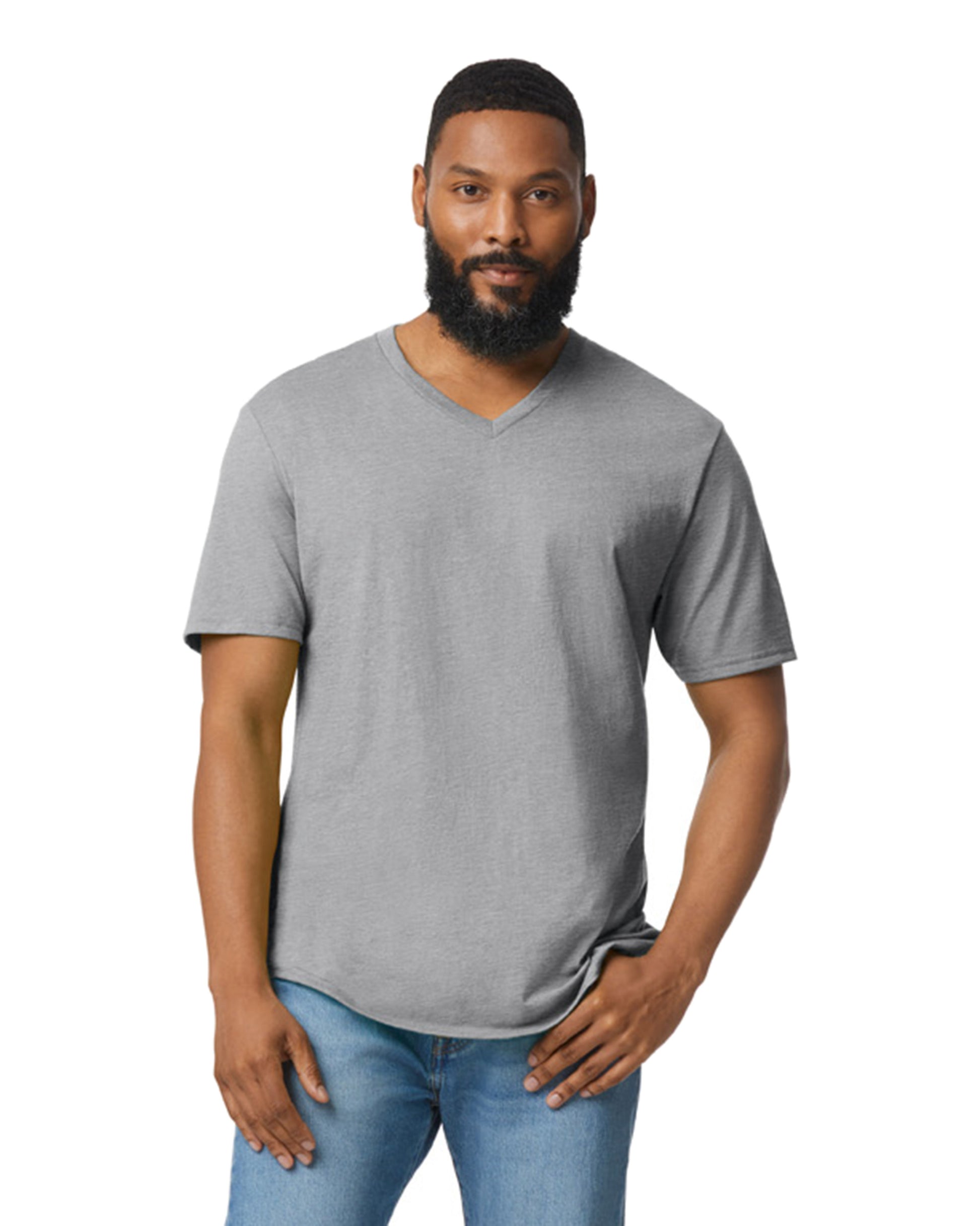 Front view of bearded man wearing grey Gildan 64V00 Soft Cotton Adult V-Neck T-Shirt with left hand resting on trouser pocket