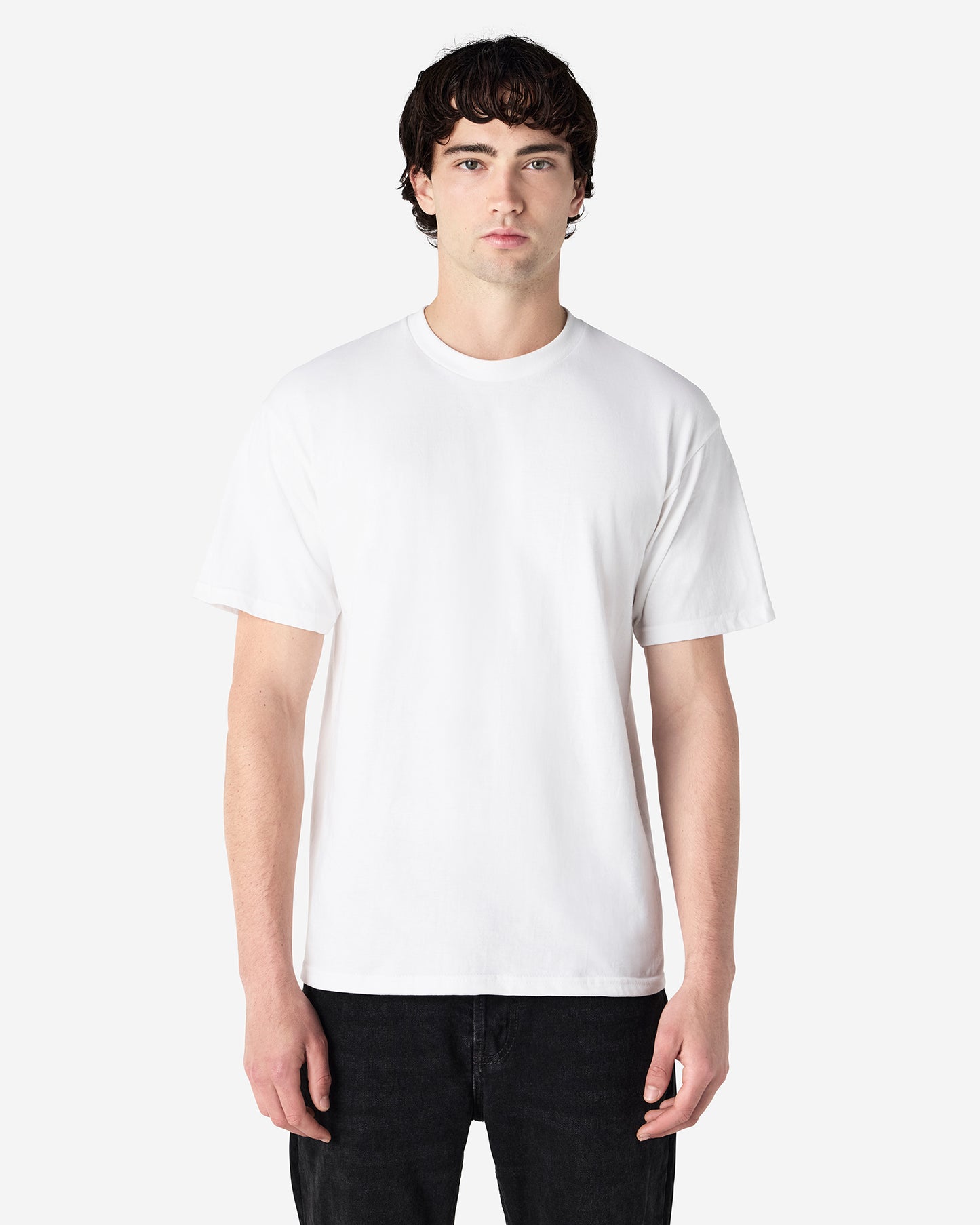 Front view of man wearing white Gildan Hammer T-Shirt looking straight head