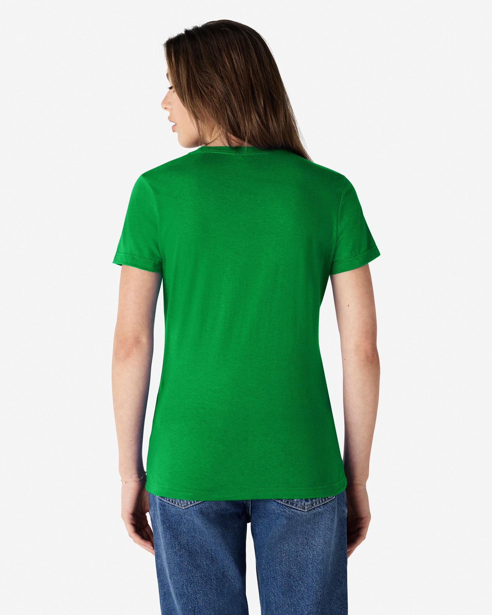 Back view of woman wearing irish green coloured Gildan Softstyle Womens T-Shirt looking left
