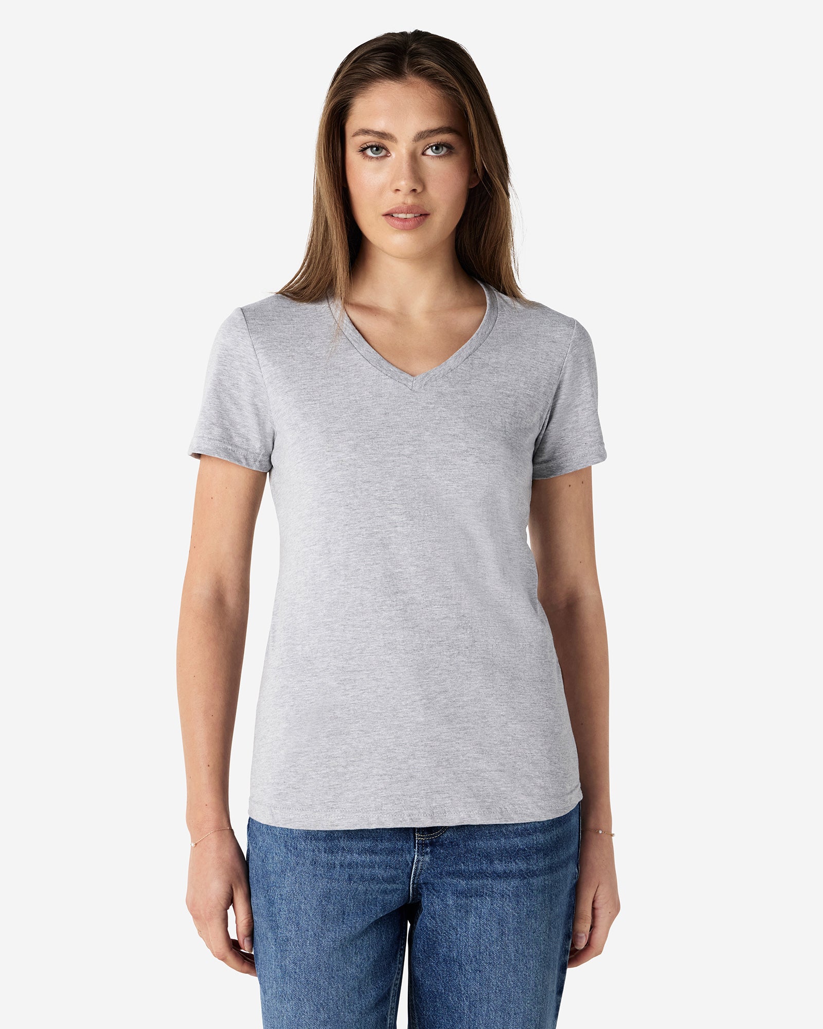 Front view of woman wearing grey Gildan Softstyle Womens V-Neck T-Shirt looking directly at camera
