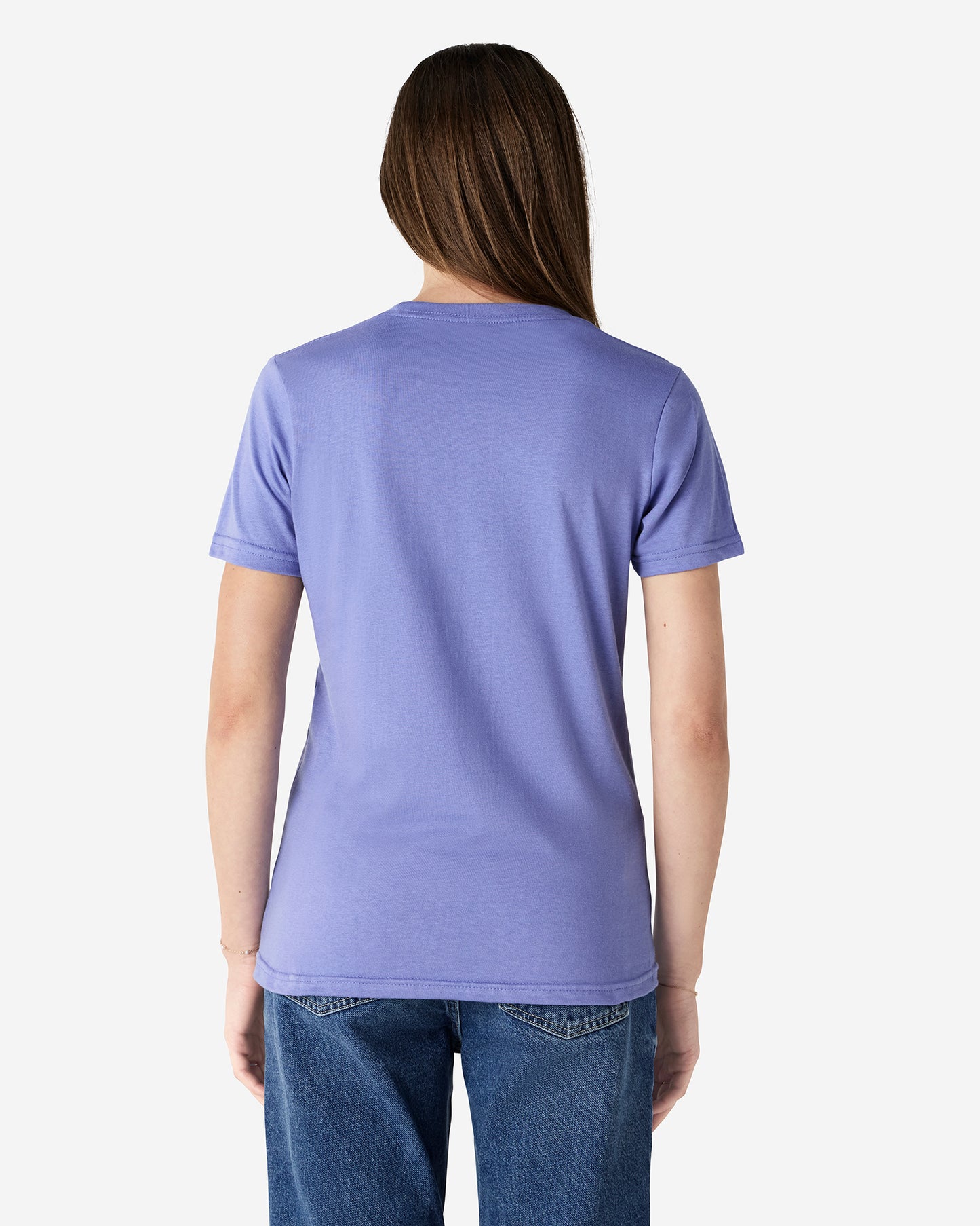 Back view of woman wearing violet coloured Gildan Softstyle 65000L Womens T-Shirt with hair over right shoulder
