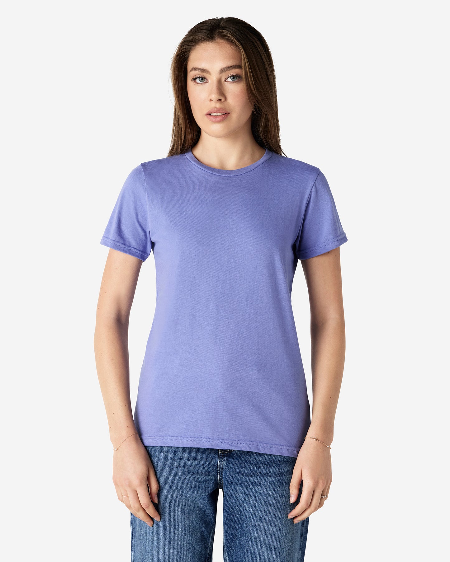 Front view of woman wearing violet coloured Gildan Softstyle 65000L Womens T-Shirt looking straight ahead