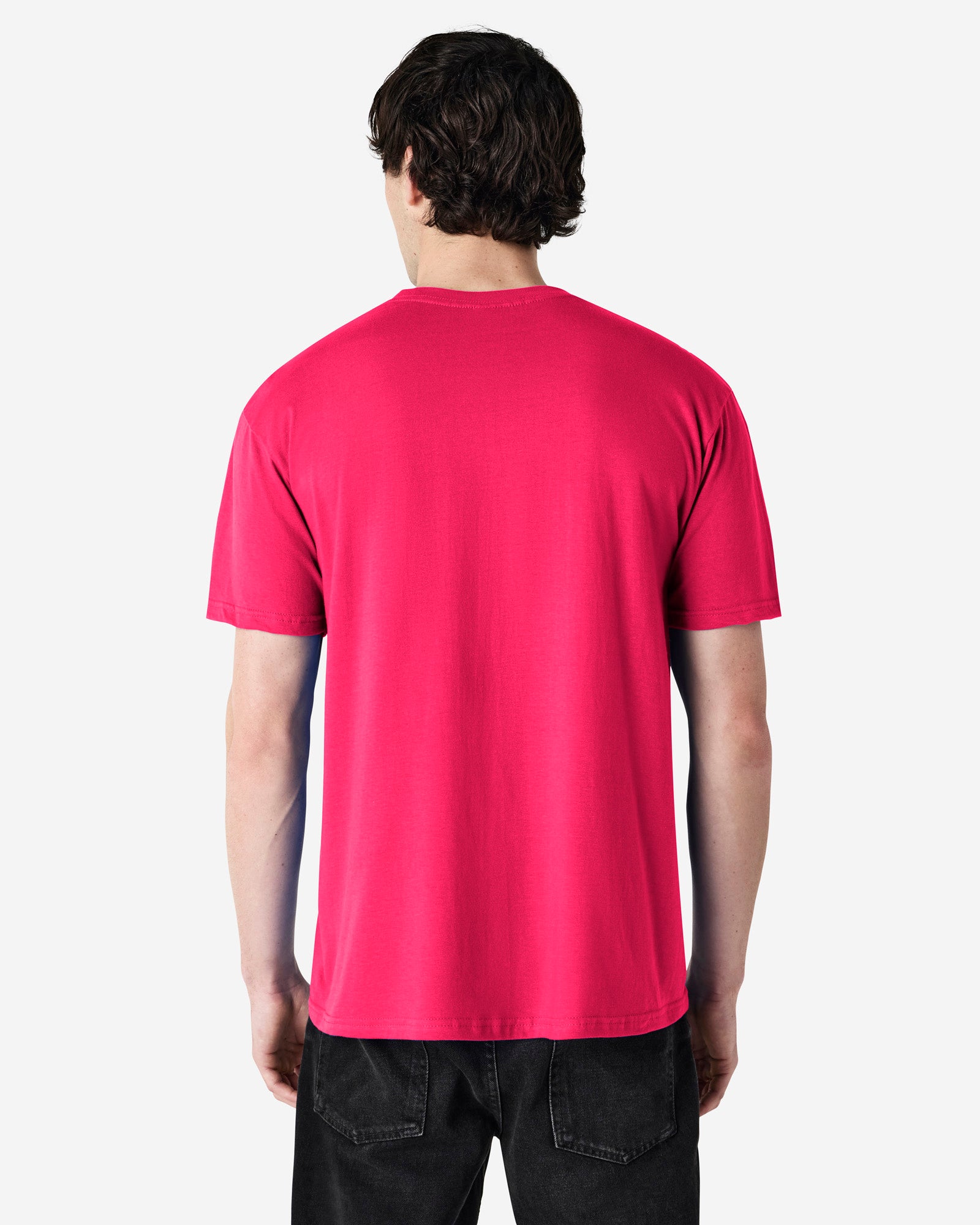Back view of man wearing heliconia coloured Gildan Softstyle Adult T-Shirt looking slightly left