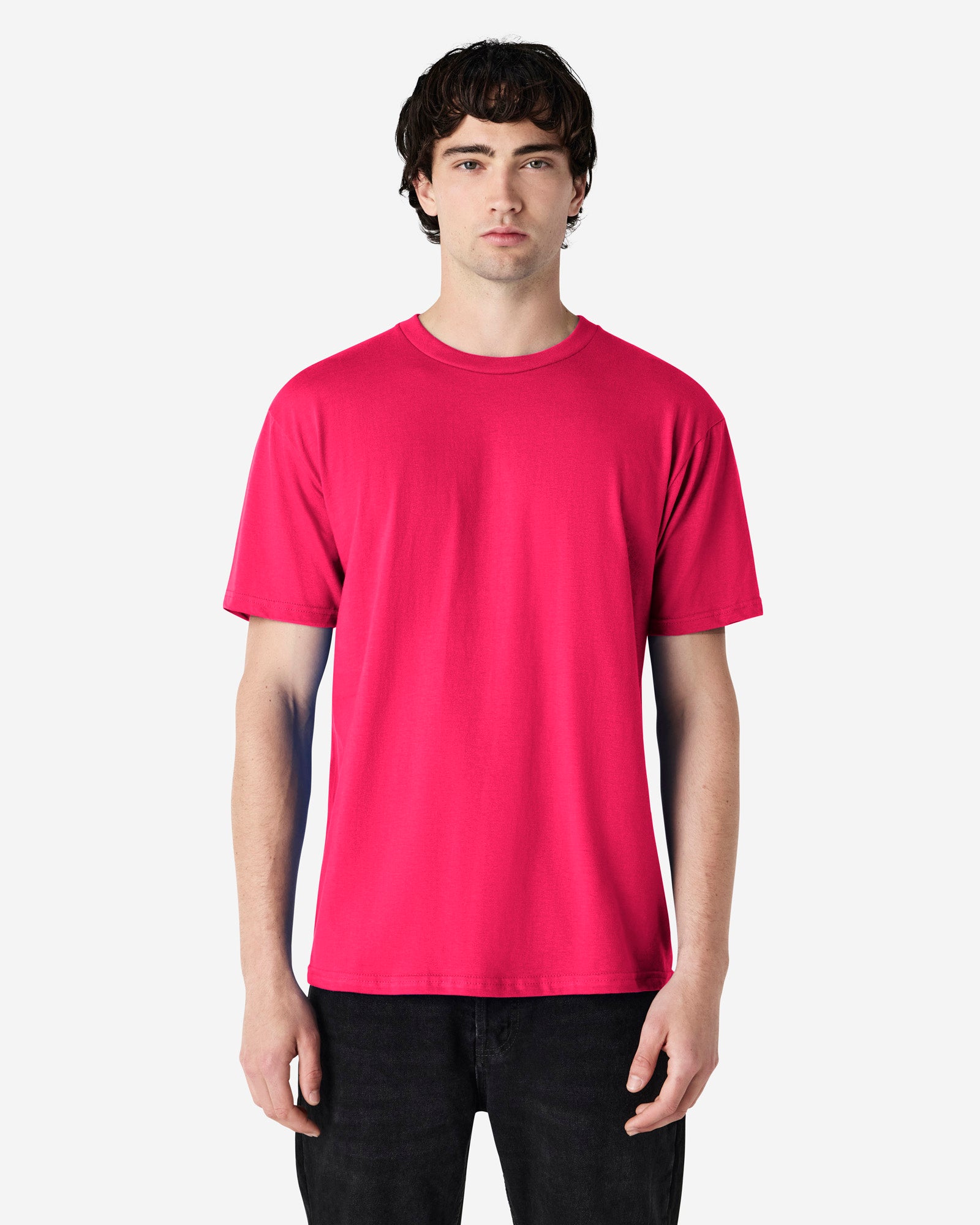 Front view of man wearing heliconia coloured Gildan Softstyle Adult T-Shirt looking straight ahead